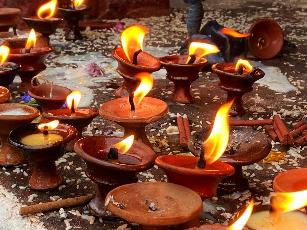 Burning Oil Candles at Boudhanath Stupa